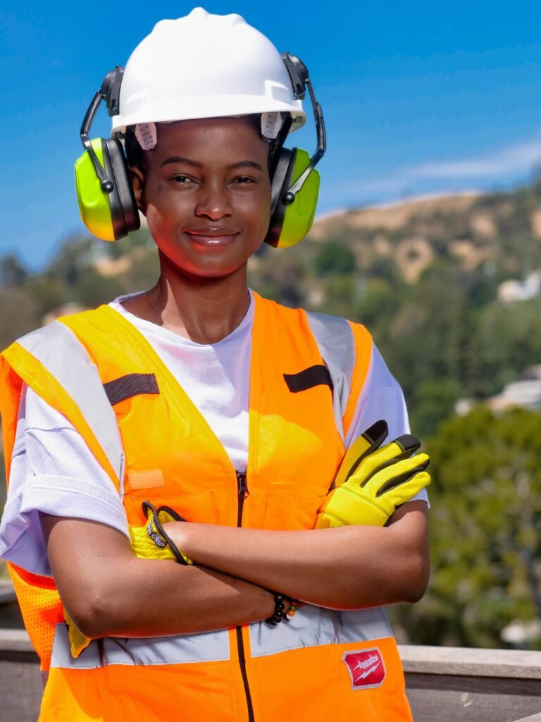 pexels-photo-8487341-8487341 Handywoman in Reflective Vest and White Hardhat